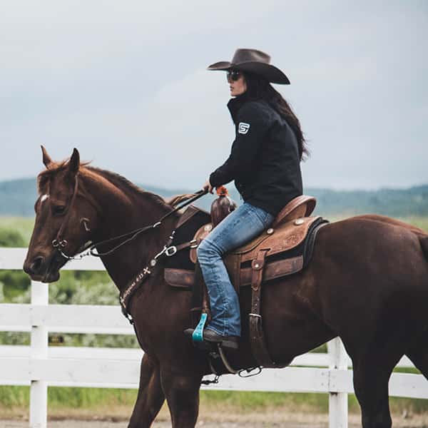 EQU Streamz advanced magnetic fetlock and hock bands for horse and ponies joint care and wellbeing image of sponsored professional equestrian rider dressage barrel racing eventing showjumping racing and much more. Unique magnetic approach for horses. 